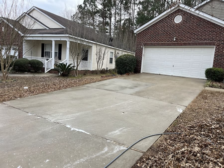 Driveway Cleaning in Columbia, SC: How to Remove Algae Safely Without Etching Concrete